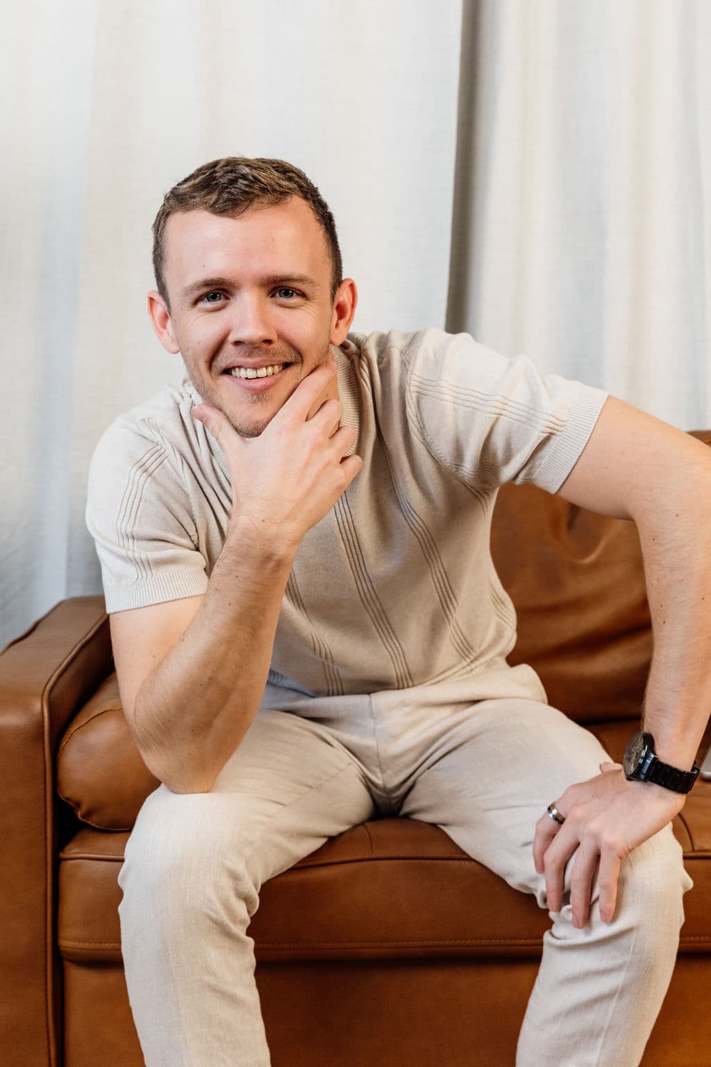 Jayden from Loom Digital in a conversational studio portrait